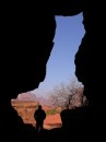 Looking out of Khazali Canyon * Jim standing at the opening of the Khazali Canyon. * 576 x 770 * (57KB)